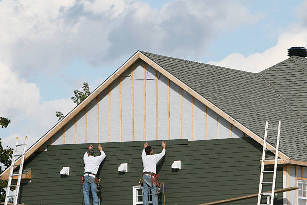 Professional Emergency Siding Repair technician working in Anna, OH